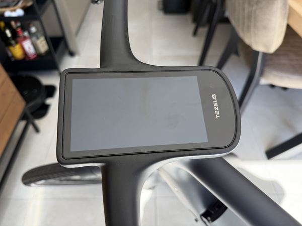 Close-up of the Tezeus C8 display showing the TEZEUS logo on the cockpit screen